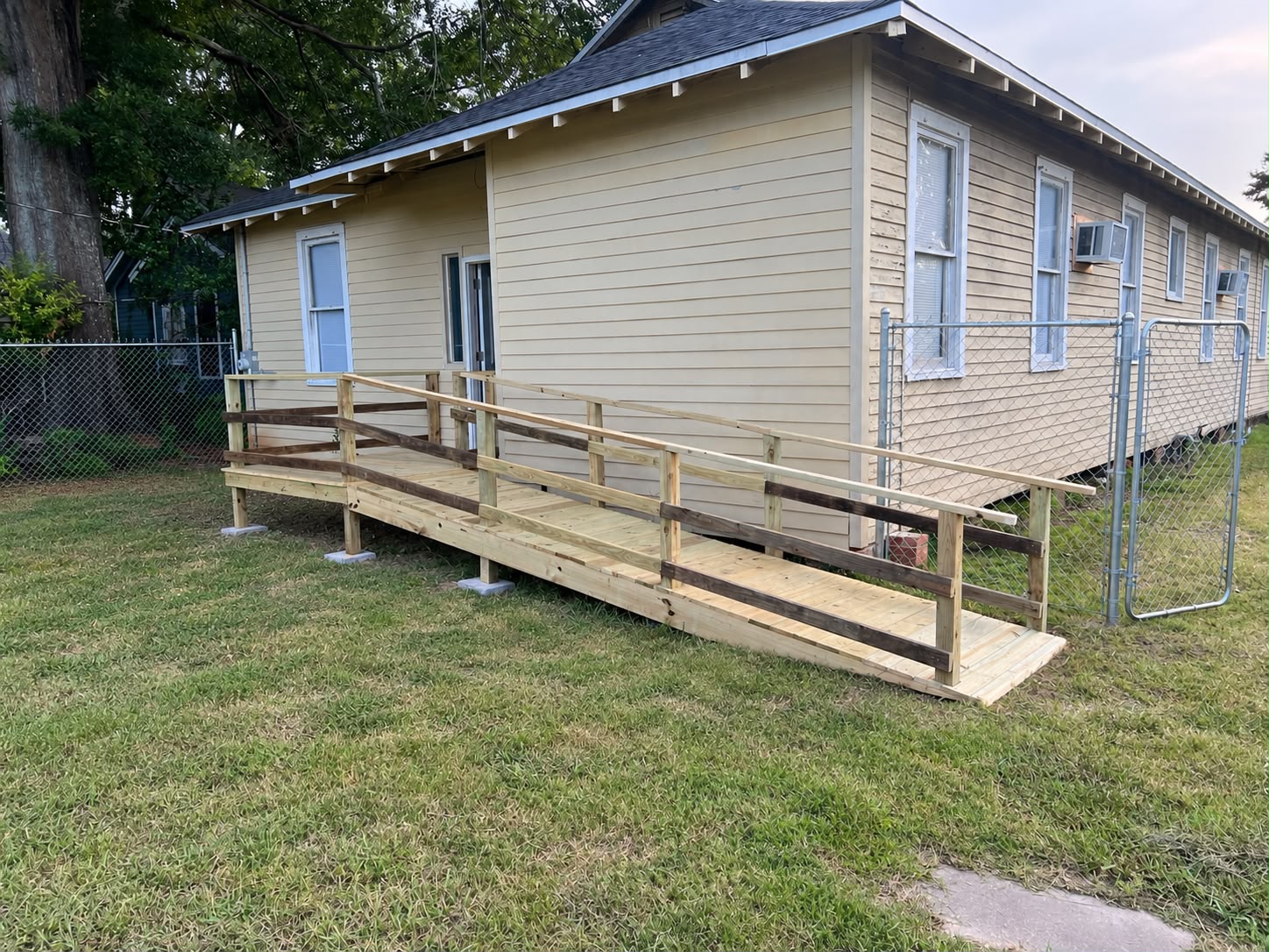 New wooden access ramp outside a home
