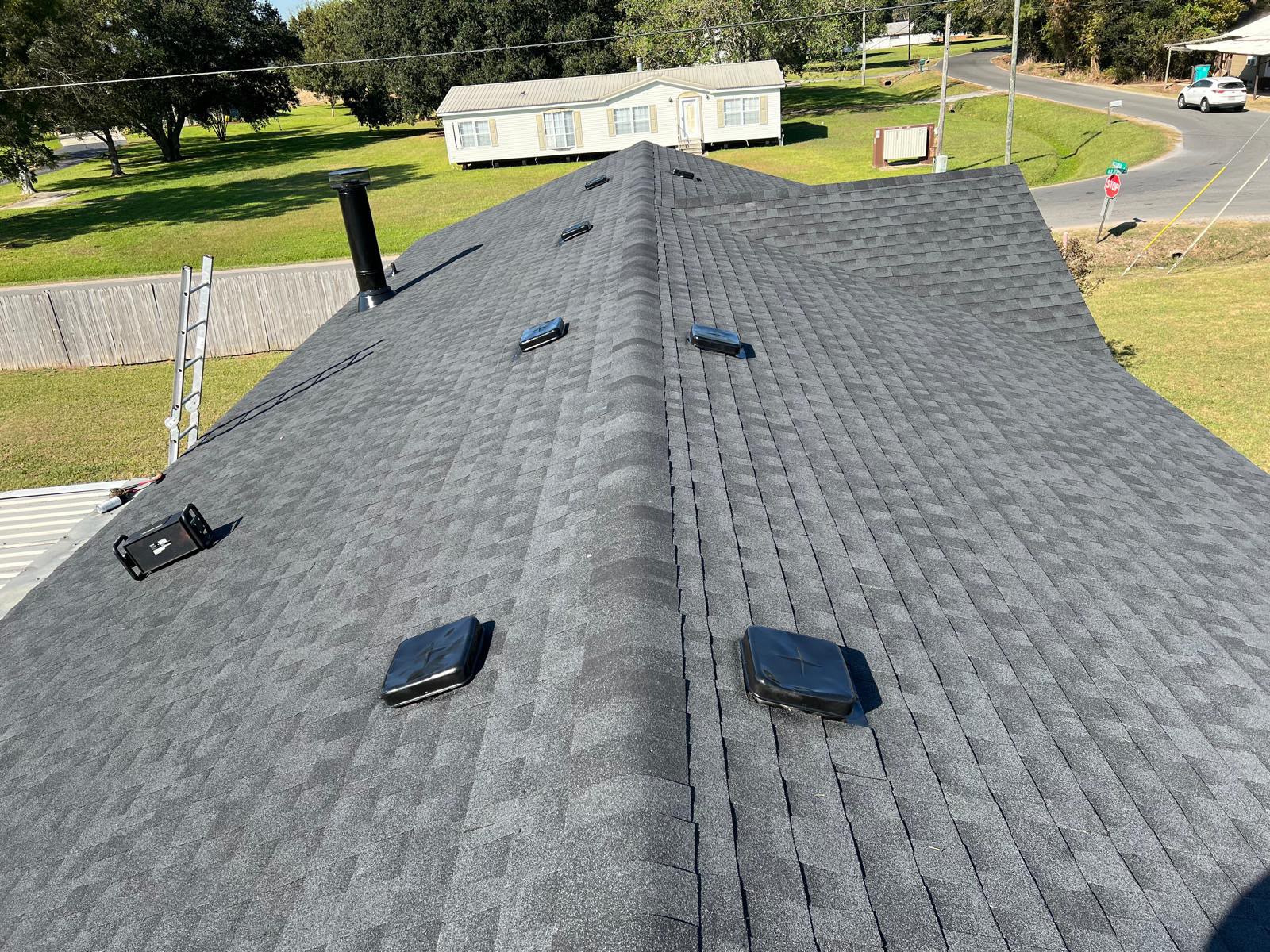 Mobile home roof after shingle replacement