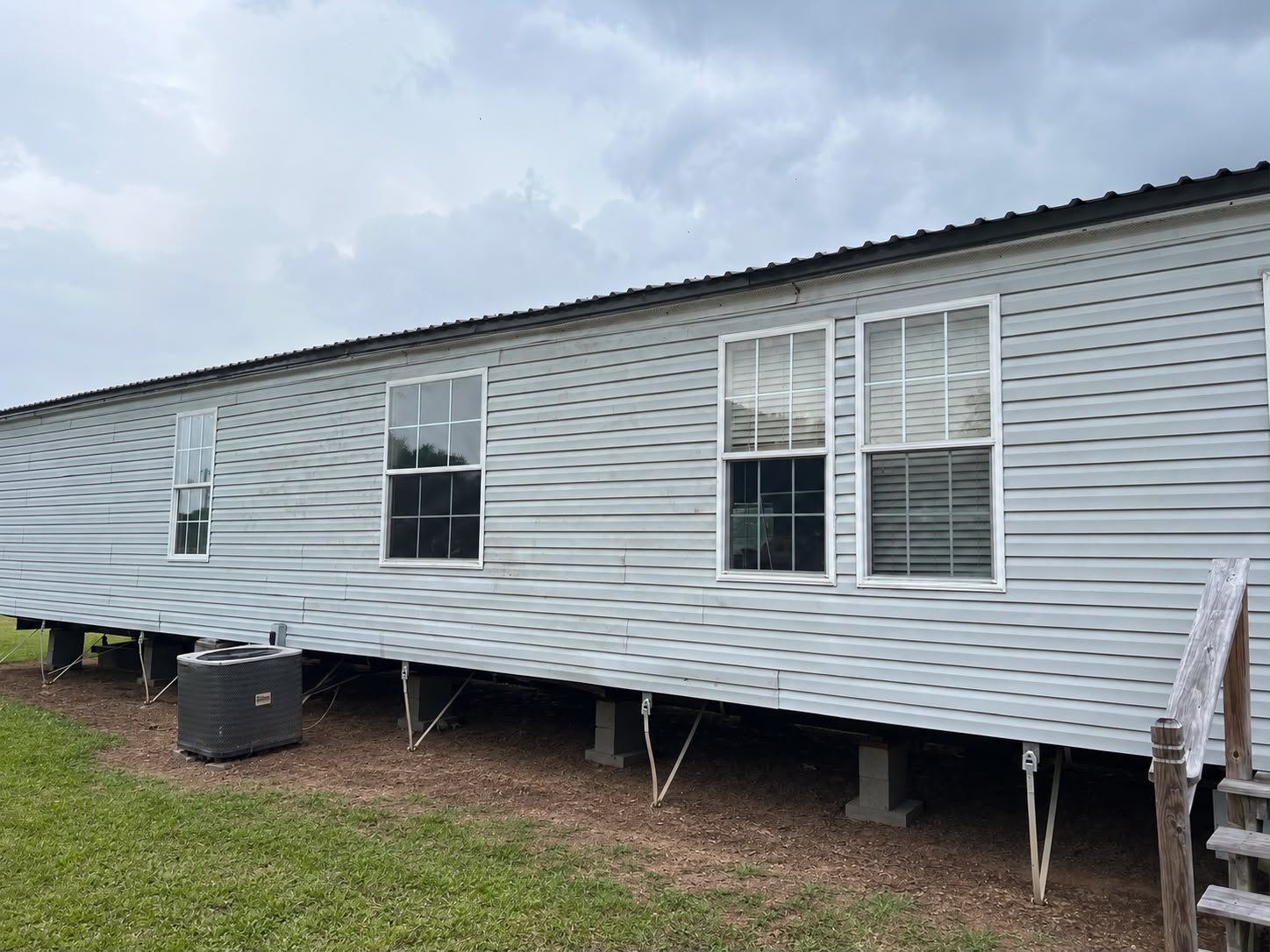 Mobile home exterior with siding and windows
